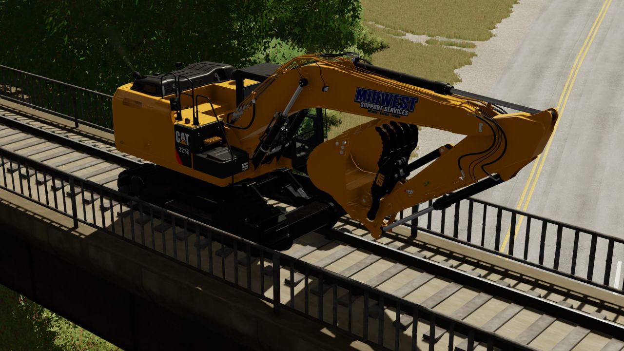 Caterpillar 323E Hi-Rail