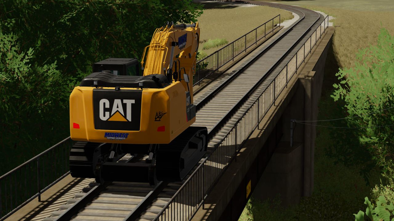 Caterpillar 323E Hi-Rail