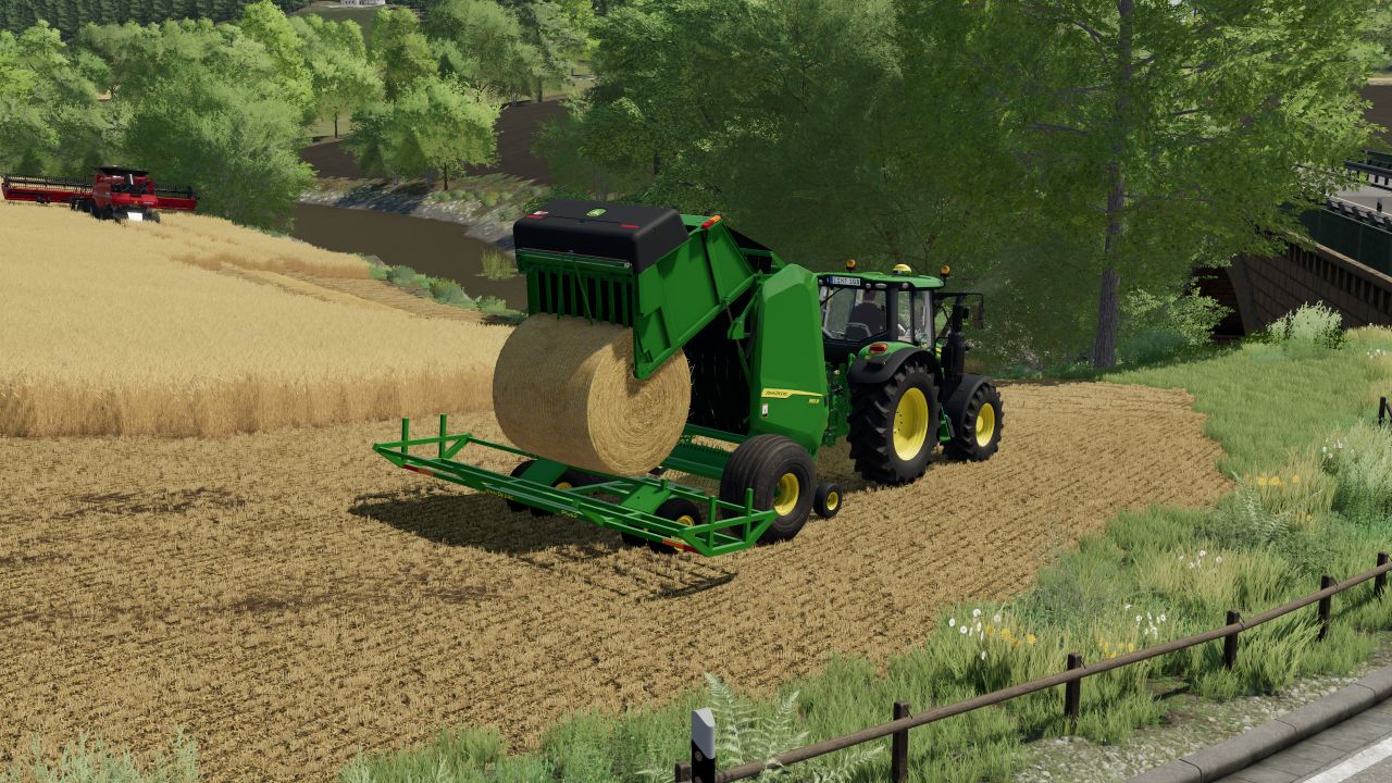 John Deere 561R + akumulator