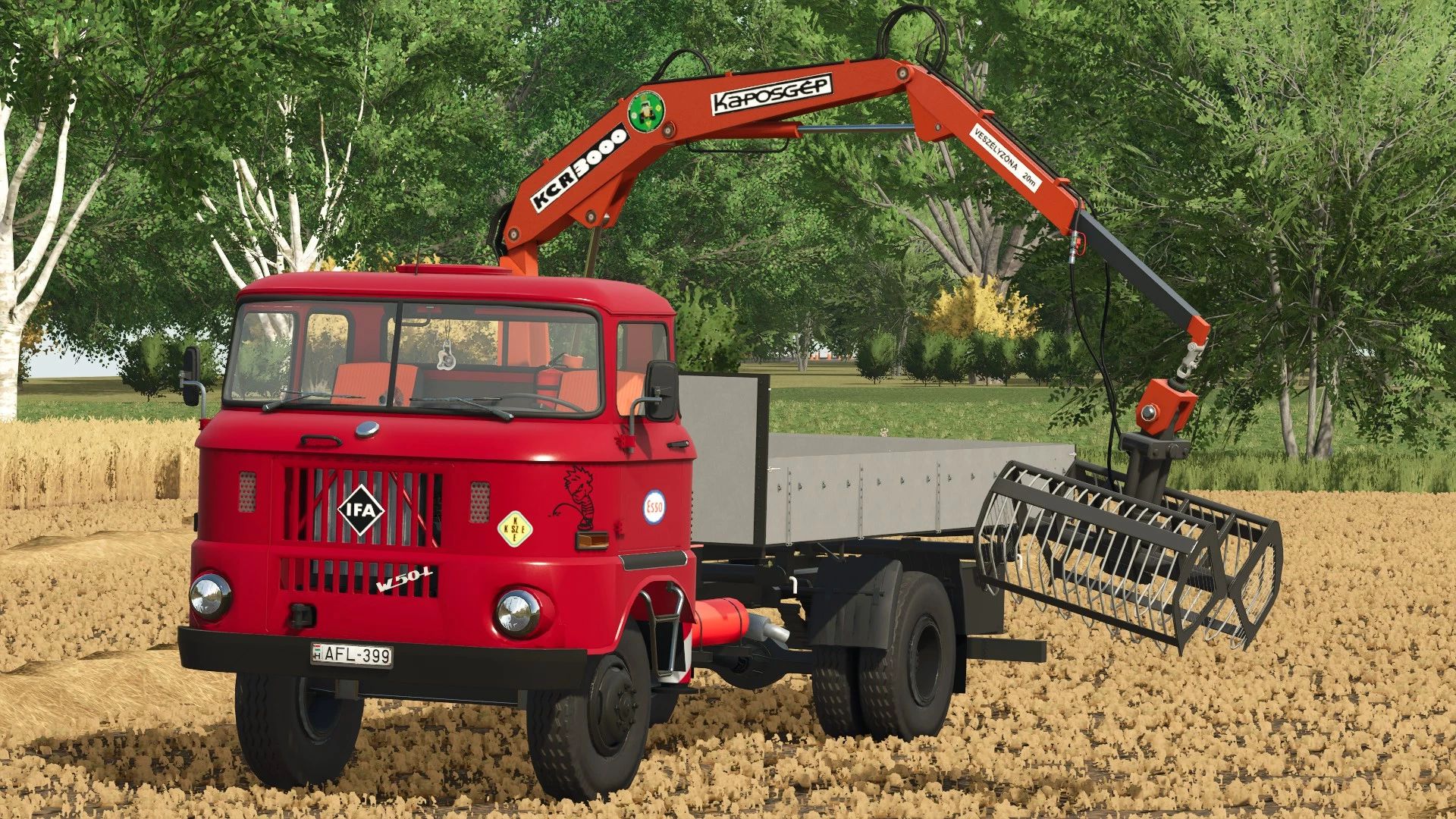 IFA W50 loading car with crane