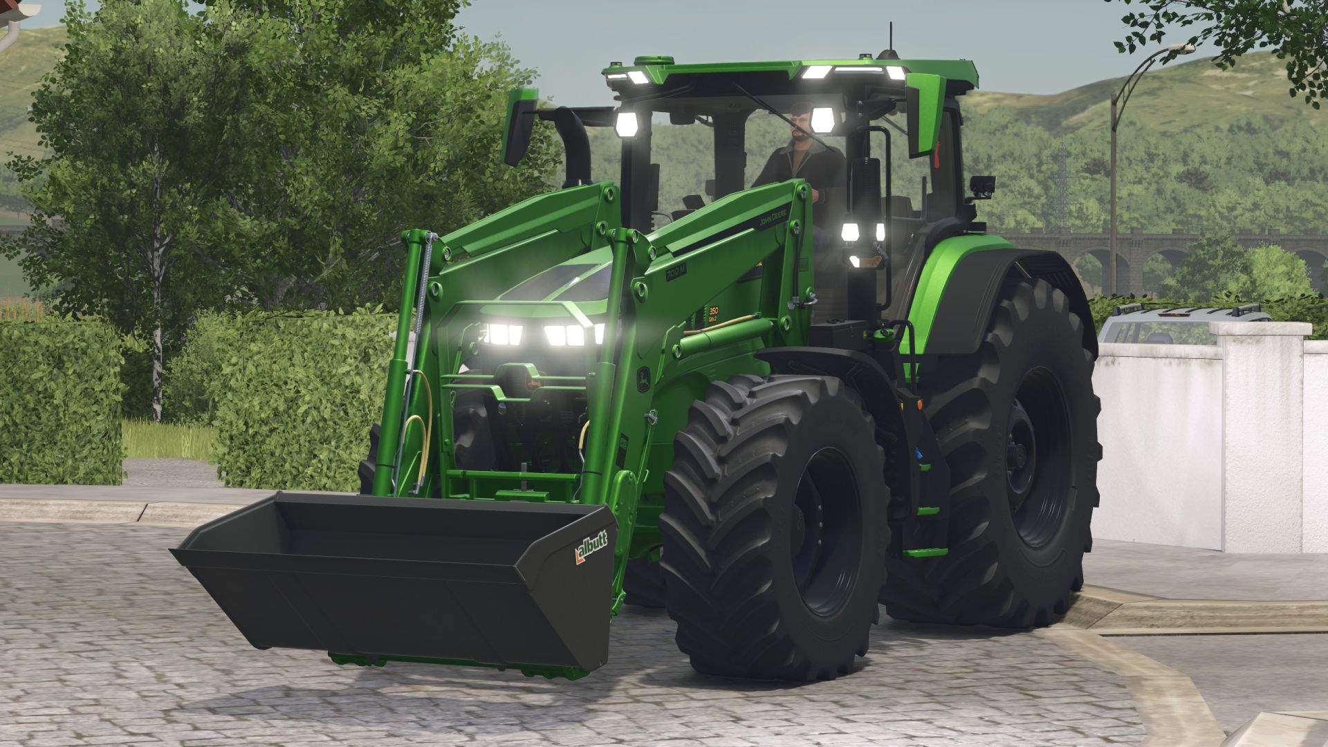 John Deere 7r z przednią ładowarką